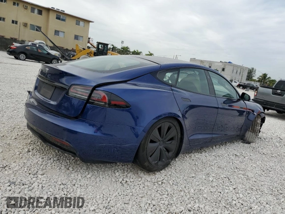 2023 Tesla Model S with VIN 5YJSA1E58PF498685, listed as a Copart auction lot 41690475 with Not provided miles and Salvage title. Bid and sale history available at DreamBid. Image 3.