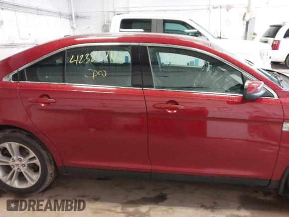 2015 Ford Taurus SEL with VIN 1FAHP2E82FG124009, listed as a IAAI auction lot 42323744 with 159,196 mi miles and . Bid and sale history available at DreamBid. Image 13.