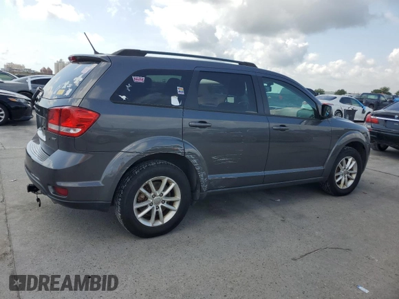 2014 Dodge Journey SXT with VIN 3C4PDCBG8ET140984, listed as a Copart auction lot 54408445 with 135,290 mi miles and Salvage Title. Bid and sale history available at DreamBid. Image 3.