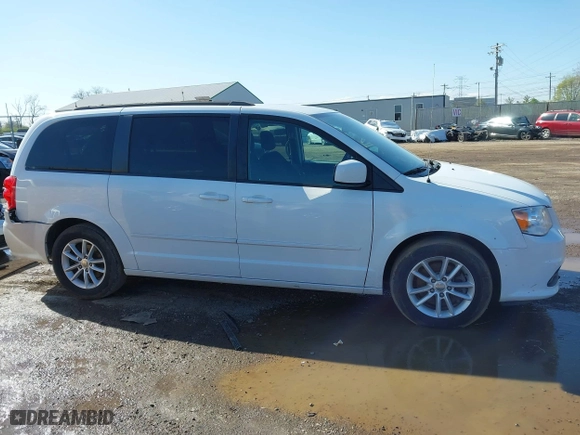 2016 Dodge Grand Caravan SXT with VIN 2C4RDGCG2GR390001, listed as a IAAI auction lot 41943622 with 127,328 mi miles. Bid and sale history available at carsss.com. Image 13.