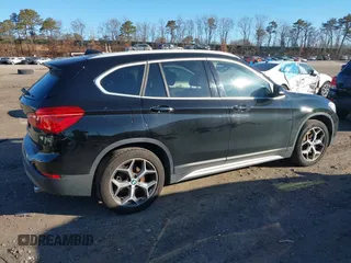 2018 BMW X1 xDrive28i with VIN WBXHT3C36J5L29746, listed as a IAAI auction lot 41547100 with 103,420 mi miles and . Bid and sale history available at DreamBid. Image 4.