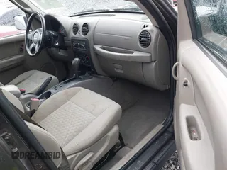 2005 Jeep Liberty Sport with VIN 1J4GL48K45W581892, listed as a IAAI auction lot 41908767 with 168,151 mi miles. Bid and sale history available at carsss.com. Image 5.