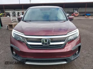 2021 Honda Pilot EX-L with VIN 5FNYF6H53MB094015, listed as a IAAI auction lot 42545722 with 66,065 mi miles and . Bid and sale history available at DreamBid. Image 12.