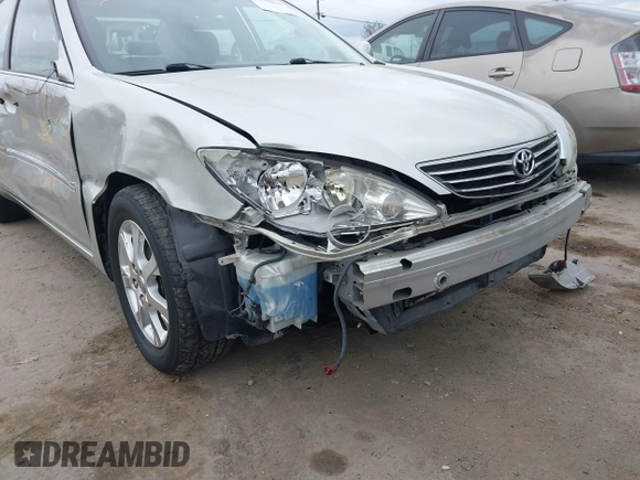 2005 Toyota Camry LE with VIN JTDBF30K650163057, listed as a IAAI auction lot 41730270 with 98,300 mi miles and . Bid and sale history available at DreamBid. Image 6.