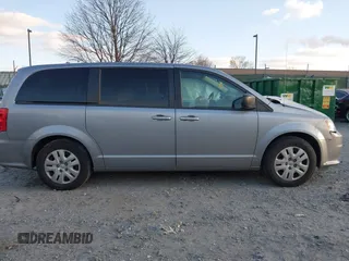 2018 Dodge Grand Caravan SE z VIN 2C4RDGBG9JR364276, wystawiony jako IAAI lot #41343237 z przebiegiem 110 893 mil mil oraz . Historia ofert i sprzedaży dostępna na DreamBid. Obrazek 12.
