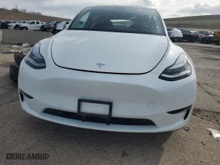 2021 Tesla Model Y Long Range with VIN 5YJYGDEEXMF299515, listed as a Copart auction lot 51978555 with 30,459 mi miles and Salvage Title. Bid and sale history available at carsss.com. Image 5.