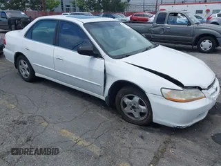 2000 Honda Accord EX z VIN 1HGCG1654YA054197, wystawiony jako IAAI lot #42151843 z przebiegiem 280 995 mil mil oraz . Historia ofert i sprzedaży dostępna na DreamBid. Obrazek 1.