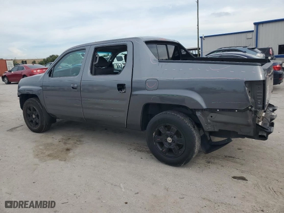 2012 Honda Ridgeline RTS with VIN 5FPYK1F46CB460256, listed as a Copart auction lot 70879644 with 136,217 mi miles and Salvage Title. Bid and sale history available at carsss.com. Image 2.