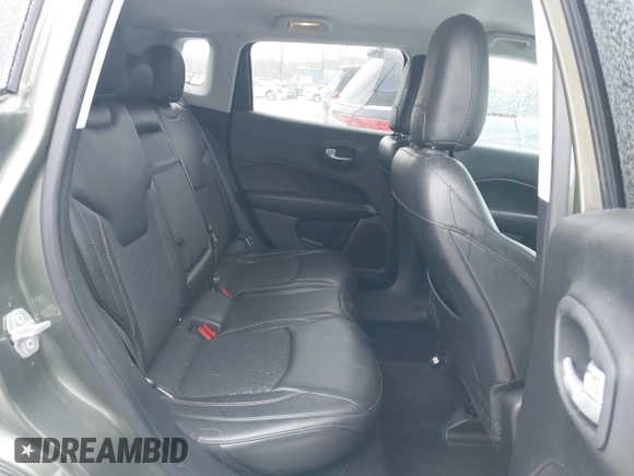 2018 Jeep Compass Altitude with VIN 3C4NJDBB1JT479462, listed as a IAAI auction lot 41276119 with 58,895 mi miles and . Bid and sale history available at carsss.com. Image 8.