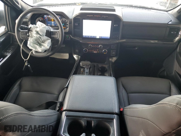 2023 Ford F-150 XL with VIN 1FTEW1CP9PKD19429, listed as a Copart auction lot 58021125 with 13,678 mi miles and Salvage title. Bid and sale history available at DreamBid. Image 8.