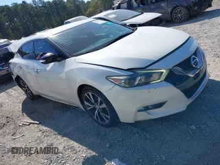 2016 Nissan Maxima SV z VIN 1N4AA6AP7GC404573, wystawiony jako IAAI lot #40564145 z przebiegiem 154 437 mil mil oraz . Historia ofert i sprzedaży dostępna na DreamBid. Obrazek 1.