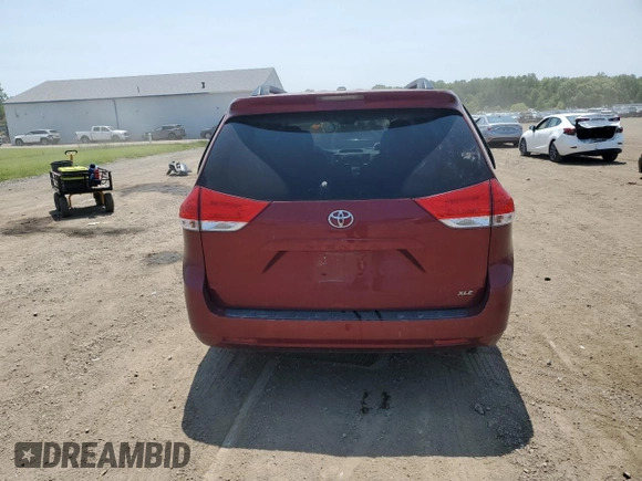 2012 Toyota Sienna XLE AAS с VIN 5TDYK3DC8CS213413, выставлен на аукционе Copart как лот 58670965 с пробегом 175 213 миль миль и Списание • Salvage title. История ставок и продаж доступна на DreamBid. Изображение 6.