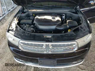 2018 Dodge Durango SXT z VIN 1C4RDJAG9JC483324, wystawiony jako Copart lot #61355725 z przebiegiem 111 175 mil mil oraz Szkoda całkowita • Salvage title. Historia ofert i sprzedaży dostępna na DreamBid. Obrazek 12.