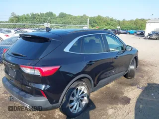 2021 Ford Escape Titanium Hybrid with VIN 1FMCU9DZ0MUB14833, listed as a IAAI auction lot 42593983 with 51,852 mi miles and . Bid and sale history available at DreamBid. Image 4.