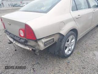 2011 Chevrolet Malibu 1LS with VIN 1G1ZB5E14BF326893, listed as a IAAI auction lot 42175943 with 163,887 mi miles and . Bid and sale history available at DreamBid. Image 13.