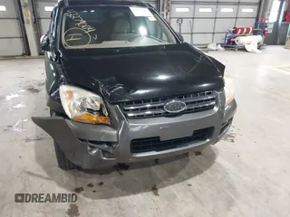 2007 Kia Sportage LX z VIN KNDJE723177439778, wystawiony jako IAAI lot #42279004 z przebiegiem 198 994 mil mil oraz . Historia ofert i sprzedaży dostępna na DreamBid. Obrazek 6.