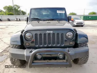 2012 Jeep Wrangler Unlimited Altitude with VIN 1C4HJWEGXCL180602, listed as a Copart auction lot 61391095 with 187,205 mi miles and Salvage title. Bid and sale history available at DreamBid. Image 5.