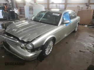 2006 Jaguar XJ with VIN SAJWA79B56SH07388, listed as a Copart auction lot 80636334 with 134,608 mi miles and Salvage Title. Bid and sale history available at carsss.com. Image 1.