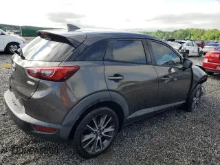 2017 Mazda CX-3 Touring z VIN JM1DKDC71H0172044, wystawiony jako Copart lot #56465125 z przebiegiem 119 374 mil mil oraz Szkoda całkowita • Salvage title. Historia ofert i sprzedaży dostępna na DreamBid. Obrazek 3.