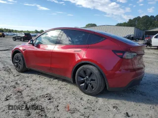 2024 Tesla Model Y Long Range with VIN 7SAYGDEE6RA318973, listed as a Copart auction lot 55586435 with 8,700 mi miles and Salvage title. Bid and sale history available at DreamBid. Image 2.