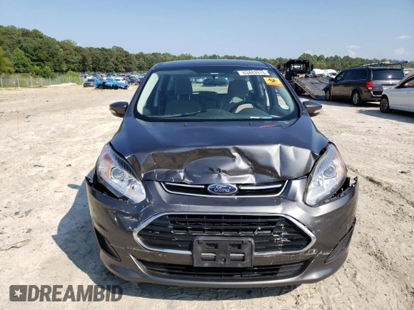 2017 Ford C-Max Energi SE with VIN 1FADP5EUXHL108664, listed as a Copart auction lot 63443913 with 104,634 mi miles. Bid and sale history available at carsss.com. Image 5.
