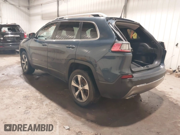 2020 Jeep Cherokee Limited with VIN 1C4PJMDX2LD516951, listed as a IAAI auction lot 41272629 with 99,717 mi miles and . Bid and sale history available at DreamBid. Image 3.