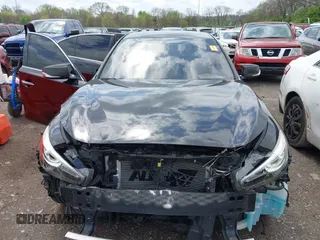 2018 Infiniti Q50 3.0t LUXE with VIN JN1EV7AP1JM355638, listed as a IAAI auction lot 41954052 with 66,663 mi miles. Bid and sale history available at carsss.com. Image 13.