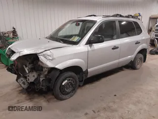 2006 Hyundai Tucson GL with VIN KM8JM12BX6U250937, listed as a IAAI auction lot 41529567 with 165,528 mi miles. Bid and sale history available at carsss.com. Image 2.