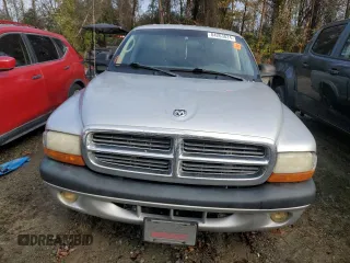 2004 Dodge Dakota Sport with VIN 1D7HL38K44S506609, listed as a Copart auction lot 84263824 with 244,242 mi miles and Salvage Title. Bid and sale history available at carsss.com. Image 5.