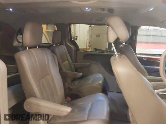 2013 Chrysler Town & Country Touring L with VIN 2C4RC1CG3DR606952, listed as a IAAI auction lot 42189429 with 145,654 mi miles and . Bid and sale history available at DreamBid. Image 8.