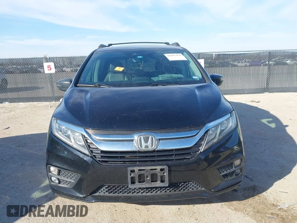 2018 Honda Odyssey EX-L z VIN 5FNRL6H74JB031306, wystawiony jako IAAI lot #41603478 z przebiegiem Nie podano mil oraz . Historia ofert i sprzedaży dostępna na DreamBid. Obrazek 12.