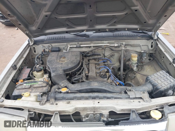 2000 Nissan Frontier XE z VIN 1N6DD21S9YC310558, wystawiony jako IAAI lot #41388581 z przebiegiem Nie podano mil oraz . Historia ofert i sprzedaży dostępna na DreamBid. Obrazek 10.