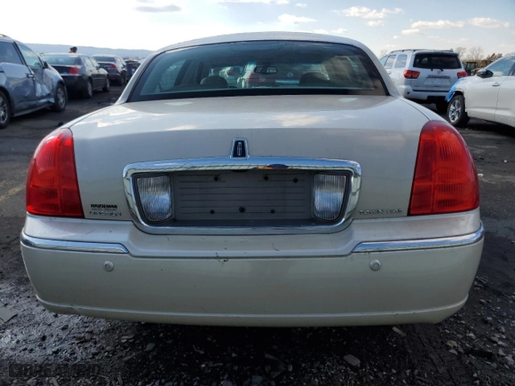 2003 Lincoln Town Car Cartier with VIN 1LNHM83WX3Y704827, listed as a Copart auction lot 44561495 with 89,936 mi miles and Salvage Title. Bid and sale history available at carsss.com. Image 6.