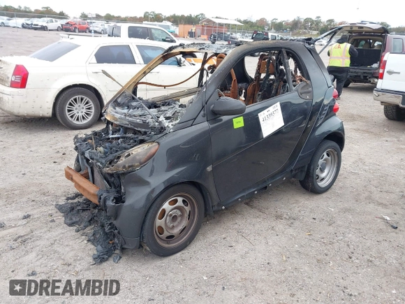 2015 Smart fortwo Passion z VIN WMEEJ3BA2FK814580, wystawiony jako IAAI lot #41339377 z przebiegiem Nie podano mil oraz . Historia ofert i sprzedaży dostępna na DreamBid. Obrazek 2.
