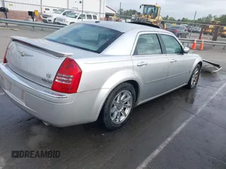 2006 Chrysler 300 C with VIN 2C3KA63H16H352507, listed as a IAAI auction lot 41926057 with 129,962 mi miles. Bid and sale history available at carsss.com. Image 4.