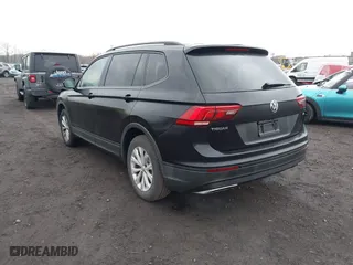 2018 Volkswagen Tiguan S with VIN 3VV1B7AX9JM091210, listed as a IAAI auction lot 41683380 with 63,627 mi miles. Bid and sale history available at carsss.com. Image 3.