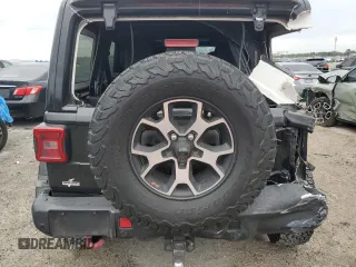 2019 Jeep Wrangler Unlimited Rubicon with VIN 1C4HJXFN6KW665805, listed as a Copart auction lot 45424005 with 141,007 mi miles and Salvage title. Bid and sale history available at DreamBid. Image 6.