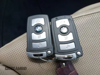 2006 BMW 7 Series 750Li z VIN WBAHN83576DT62514, wystawiony jako IAAI lot #42657343 z przebiegiem Nie podano mil oraz . Historia ofert i sprzedaży dostępna na DreamBid. Obrazek 11.