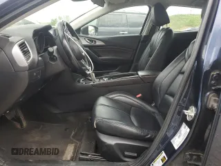 2017 Mazda 3 Touring with VIN 3MZBN1L7XHM138580, listed as a Copart auction lot 58924525 with 101,717 mi miles and Salvage title. Bid and sale history available at DreamBid. Image 7.