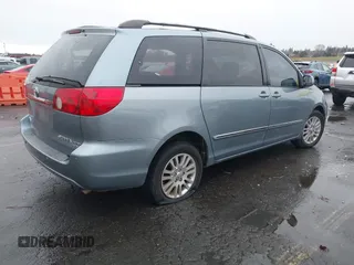 2007 Toyota Sienna XLE z VIN 5TDBK22C97S003525, wystawiony jako IAAI lot #40907947 z przebiegiem Nie podano mil oraz . Historia ofert i sprzedaży dostępna na DreamBid. Obrazek 4.