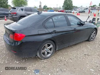 2013 BMW 3 Series 328i xDrive with VIN WBA3B5G59DNS00693, listed as a IAAI auction lot 42540218 with 125,213 mi miles and . Bid and sale history available at DreamBid. Image 4.