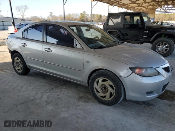 2008 Mazda 3 i Sport with VIN JM1BK12F381791446, listed as a Copart auction lot 43810635 with 134,415 mi miles and Salvage Title. Bid and sale history available at DreamBid. Image 4.