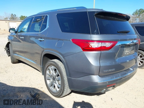 2020 Chevrolet Traverse Premier with VIN 1GNERKKW3LJ128117, listed as a IAAI auction lot 41857067 with 77,700 mi miles and . Bid and sale history available at DreamBid. Image 3.