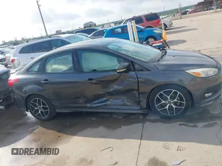 2016 Ford Focus SE z VIN 1FADP3F28GL360512, wystawiony jako IAAI lot #42427723 z przebiegiem 217 172 mil mil oraz . Historia ofert i sprzedaży dostępna na DreamBid. Obrazek 13.