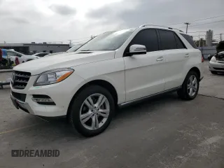 2015 Mercedes-Benz M 350 with VIN 4JGDA5JB9FA575644, listed as a Copart auction lot 62461775 with 117,031 mi miles and Salvage title. Bid and sale history available at DreamBid. Image 1.