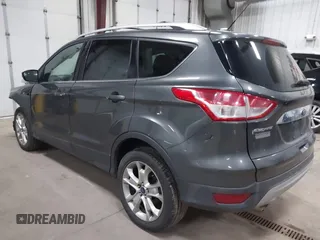 2016 Ford Escape Titanium with VIN 1FMCU9J90GUB35593, listed as a IAAI auction lot 42309020 with 173,019 mi miles and . Bid and sale history available at DreamBid. Image 3.