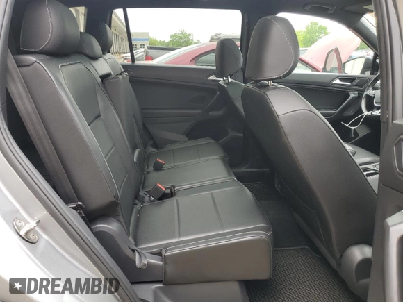 2021 Volkswagen Tiguan SE z VIN 3VV3B7AX8MM117650, wystawiony jako Copart lot #57075485 z przebiegiem 51 309 mil mil oraz Szkoda całkowita • Salvage title. Historia ofert i sprzedaży dostępna na DreamBid. Obrazek 11.