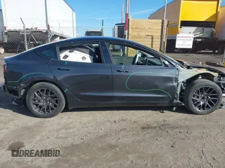 2024 Tesla Model 3 with VIN 5YJ3E1EA1RF735347, listed as a IAAI auction lot 41810655 with 14,901 mi miles. Bid and sale history available at carsss.com. Image 14.