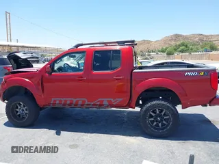 2015 Nissan Frontier SL with VIN 1N6AD0EV1FN711521, listed as a IAAI auction lot 42525352 with 203,114 mi miles and . Bid and sale history available at DreamBid. Image 14.