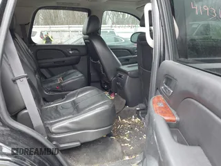 2011 GMC Yukon SLT with VIN 1GKS2CE01BR347675, listed as a IAAI auction lot 41931635 with 247,817 mi miles. Bid and sale history available at carsss.com. Image 8.
